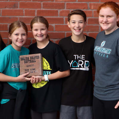 Salina Braves Softball Team with their commemorative brick