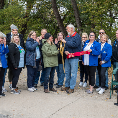 Ribbon cutting on the trail around the YMCA